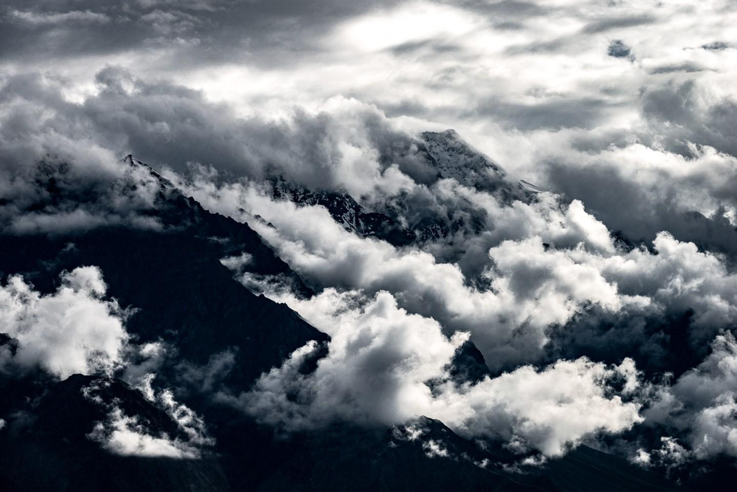 Clouds wrapping around the snow-clad peaks of Skardu Valley